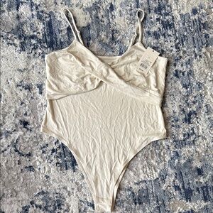 Elegant Cream Bodysuit
